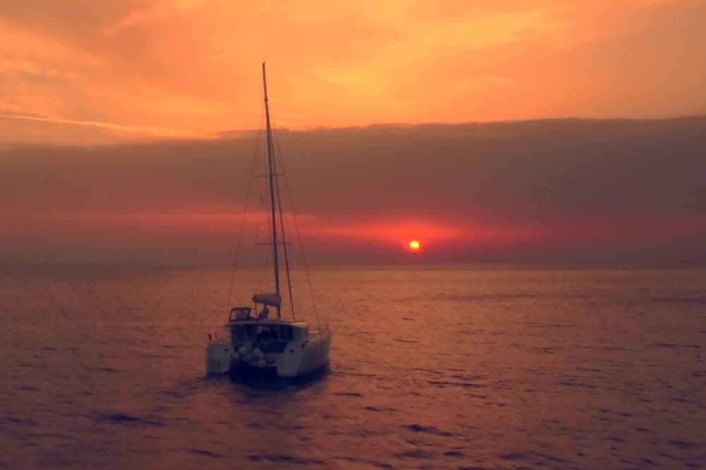 A Romantic Sunset Catamaran Semi-Private Cruise Around Santorini Island