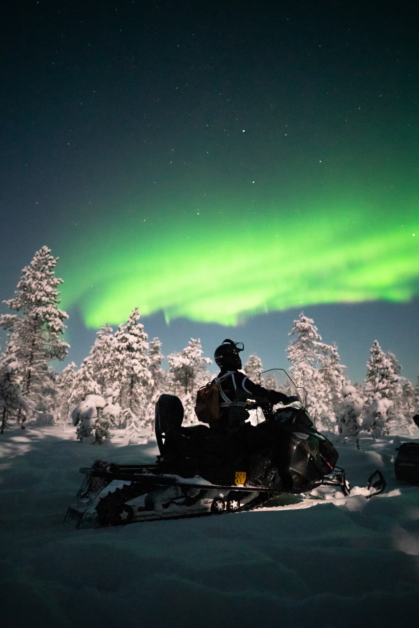 Early Evening Aurora Tour by Snowmobile