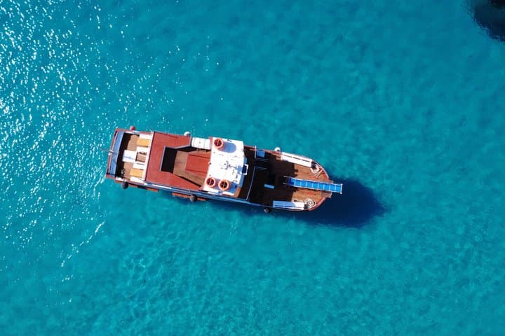 Ibiza Beach Hopper with Lunch Open Bar Paddle Surf and Snorkeling